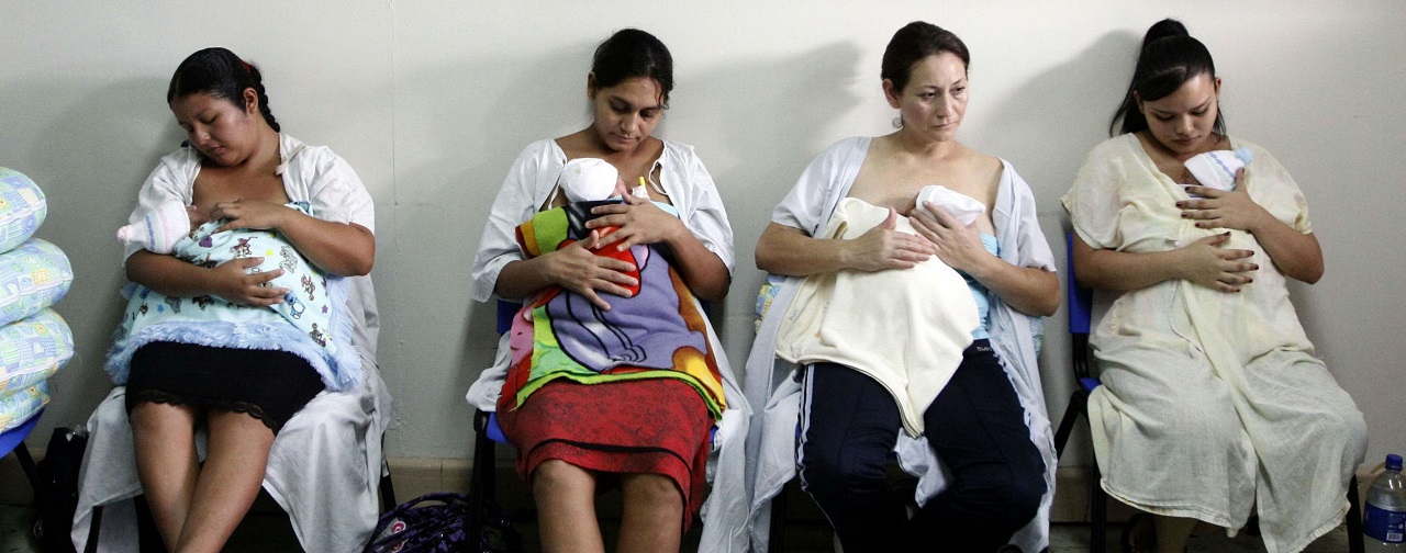 A group of Salvadoran mothers participate in the "Kangaroo Mother" program at the National Maternity Hospital in San Salvador. REUTERS/Luis Galdamez (2011)