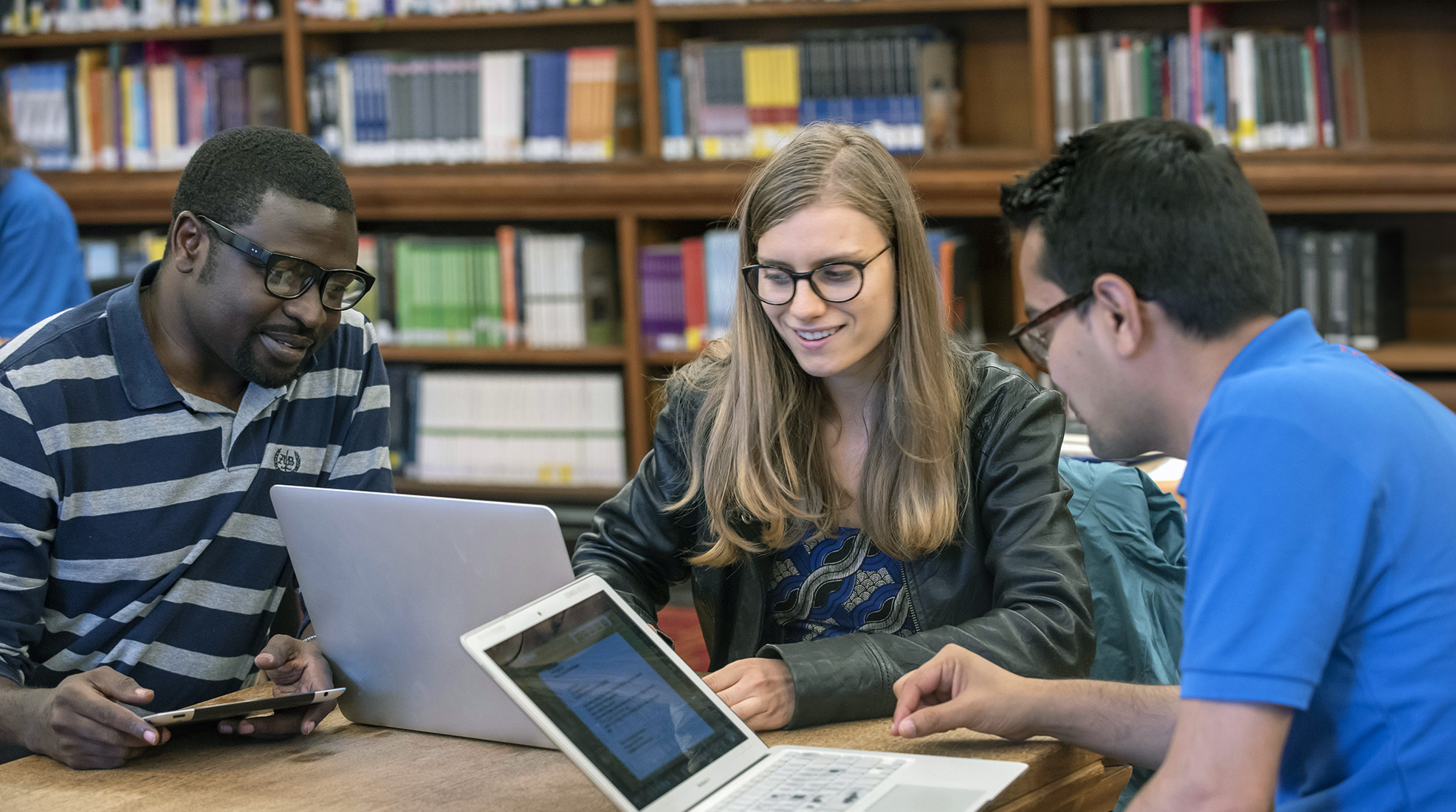 Master&#039;s students studying together in the library