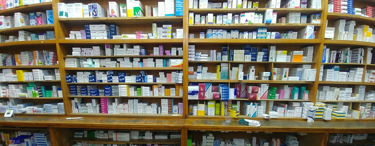 Pharmacy with shelves filled with medicine
