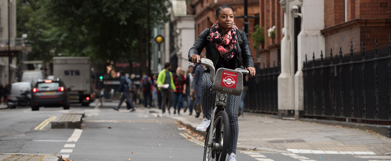 Lady cycling in London