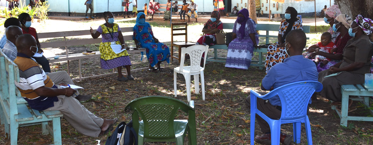 IHCoR-Africa team members meet with community health volunteers to discuss the project