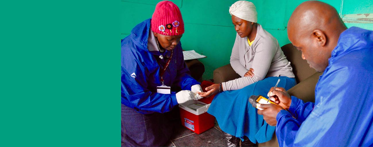 Medical practitioner doing PopArt Chip testing. Credit Ms Kim Cloete