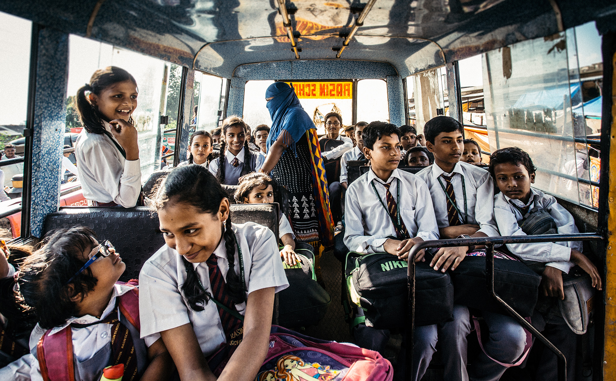 Teenagers on bus in India