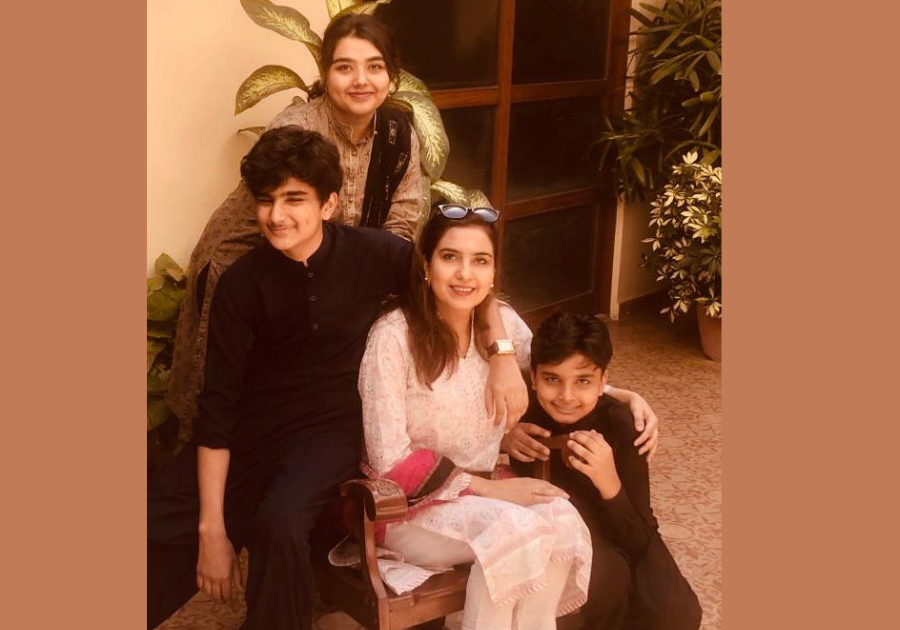 Ahsana Nazish (sitting) with her children