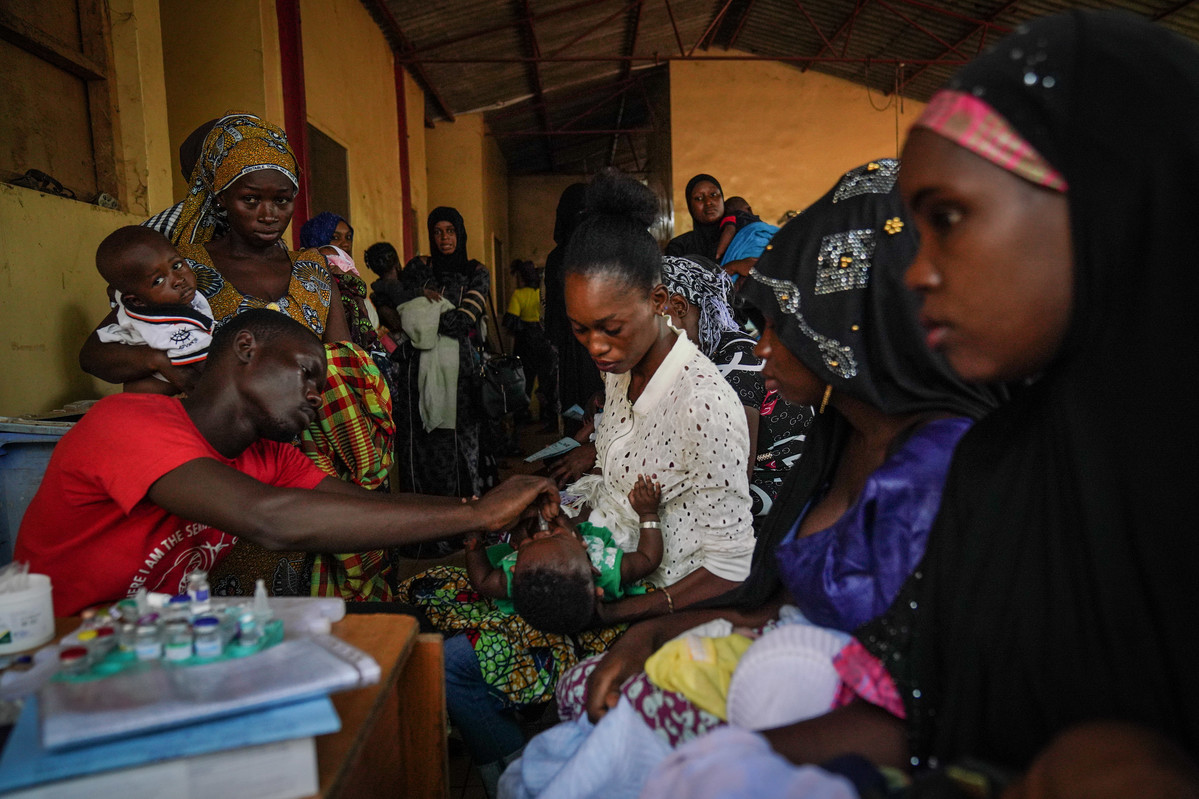 A clinician administers a dose of Pneumococcal vaccine at Basse Hospital, The Gambia. Credit: Louis Leeson/LSHTM