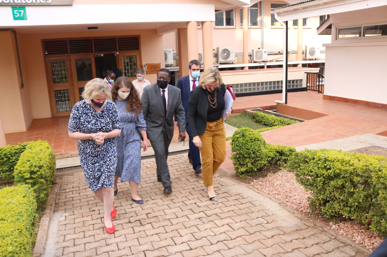 UK Minister Vicky Ford exiting the Sequencing Labs during her visit at the MRC/UVRI and LSHTM Uganda Research Unit. 