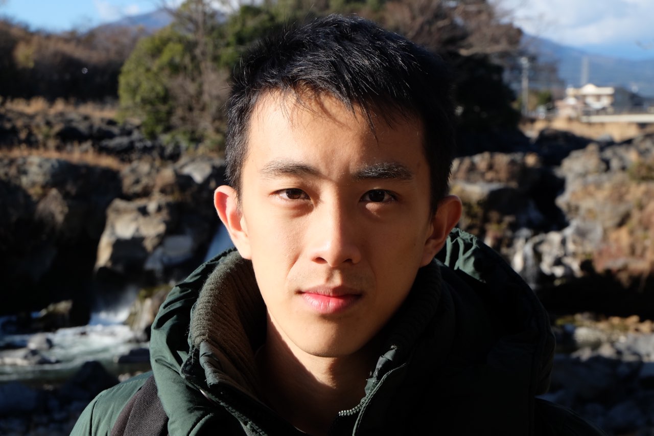 Headshot of Lim Jue Tao in outside environment