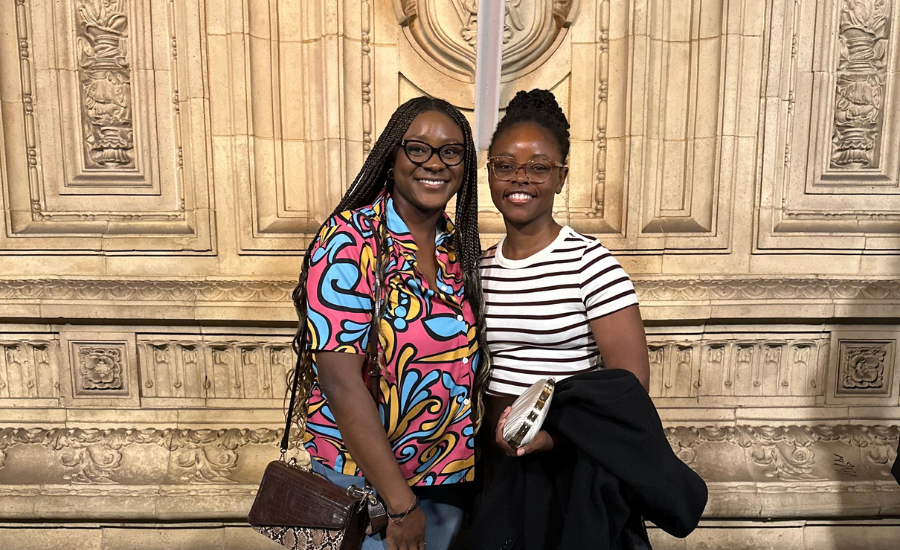 Feyi Ayanlowo and a friend at St. Albert Hall