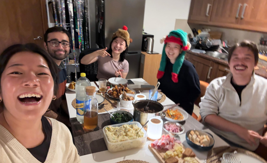 LSHTM Students having a Belgium Christmas Potluck.