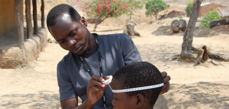 Study participant having head circumference measured in Malawi