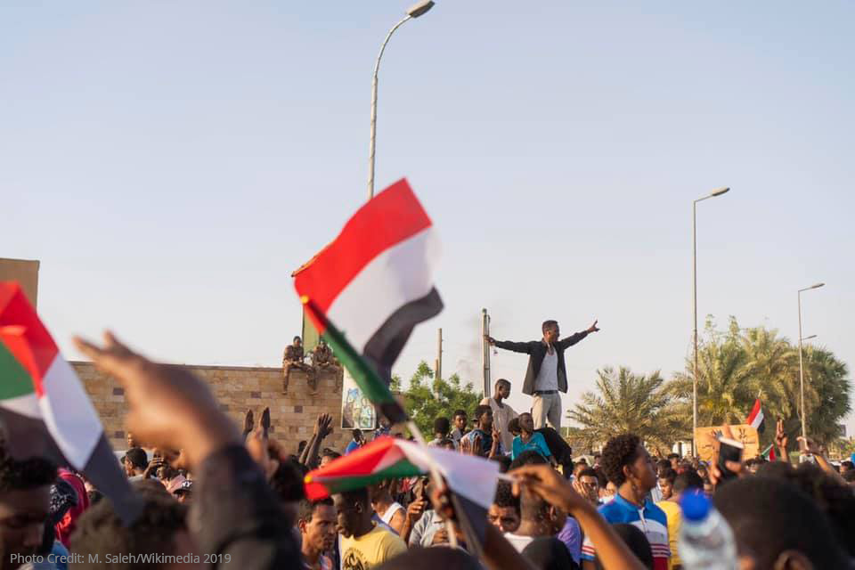 Caption: Protesters near army HQ in Khartoum. Credit: M.Saleh/Wikimedia
