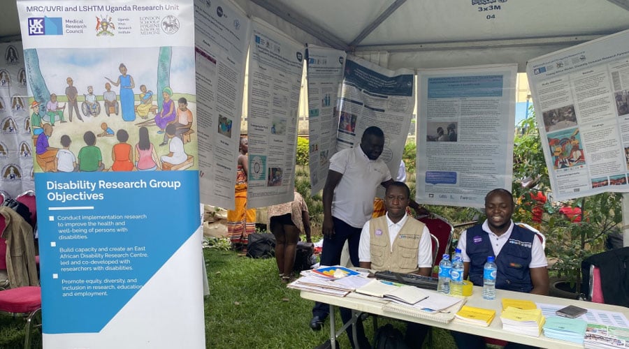 Members of the Disability Research Group exhibiting training manuals and showcasing results of disability inclusive health studies at the launch of the National Rehabilitation and Assistive Technology Strategic Plan in Uganda.