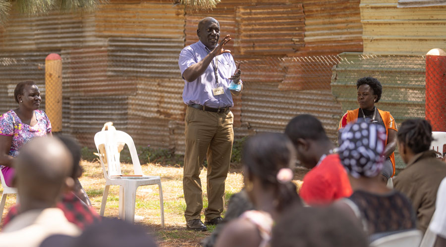 Dr Freddie Kibengo delivering community engagement exercise