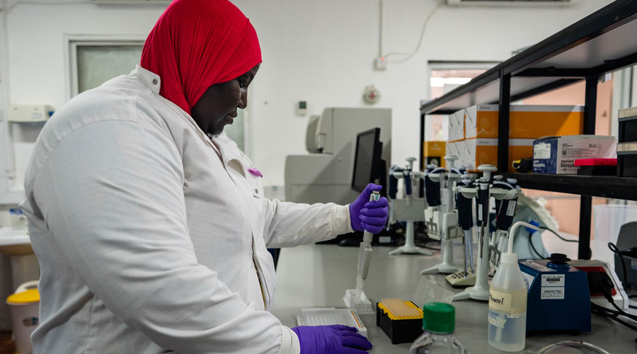 A female technician running tests in the laboratory, Fajara MRC Unit The Gambia at LSHTM