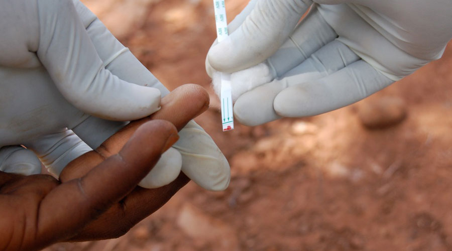 Close up of HIV test being undertaken, Uganda