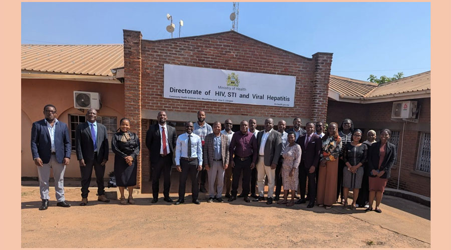 MOH team members standing outside the Directorate of HIV, STI &amp; Viral Hepatitis