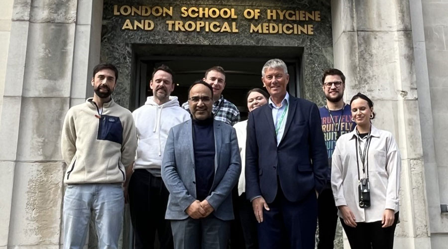 Sir Stewart Cole outside LSHTM with LSHTM staff and academics