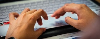 hands on lapptop