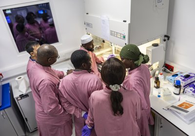 Researchers in MRCG performing lab techniques to study samples of the Mpox virus