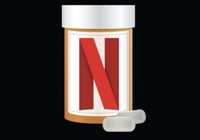 A bottle of pills with a letter on it