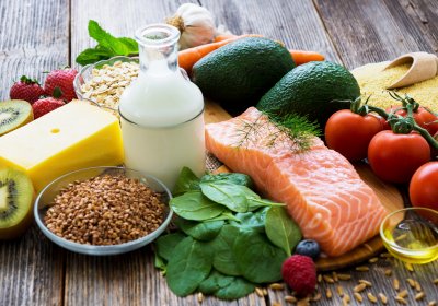 Healthy food selection including fish, milk, pulses, avocado, spinach. Credit: Daniel Vincek