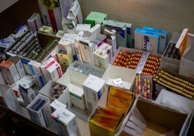 Medicines in boxes on a table