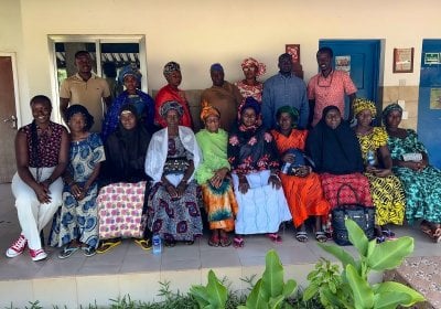 A group photo of MRCG researchers with study participants 