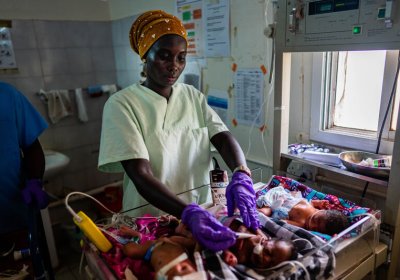 A research nurse checks the temperature of a preterm baby, at Edward Francis Small Teaching Hospital, Banjul
