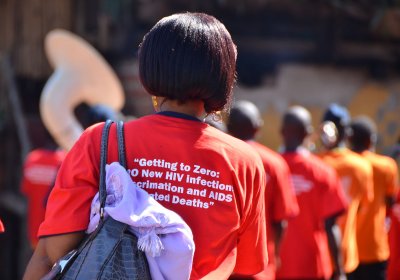 A concerned parent in Kampala, Uganda, attends a &quot;Getting to ZERO&quot; awareness campaign aimed at getting zero new HIV infections.