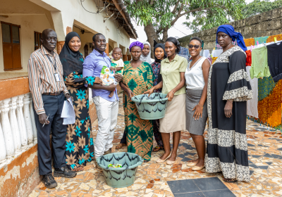 ISSC trial participant receiving gift items from MRCG