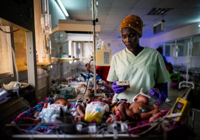 A research nurse screens a preterm baby for eligibility to the eKMC clinical trial, at Edward Francis Small Teaching Hospital, Banjul