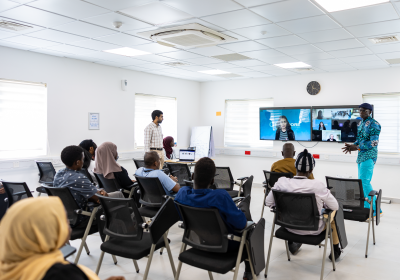 Individuals in a seminar room