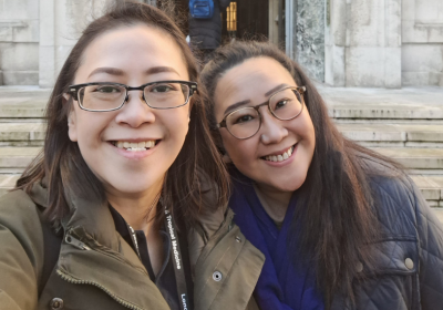 Sarah & sister selfie in front of LSHTM entrance