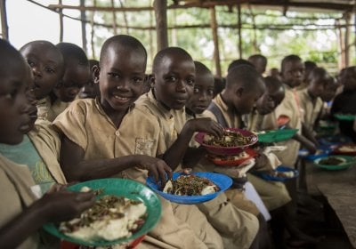 Children eating lunch at a primary school in Burundi
