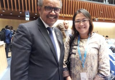 Elizabeth  Salmon with WHO Director General Tedros