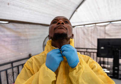 Demonstrating a correctly prepared personal protective equipment suit. Louis Leeson/LSHTM