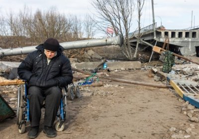 IRPIN, UKRAINE - Mar. 09, 2022: War in Ukraine. Thousands of residents of Irpin have to abandon their homes and evacuate as russian troops are bombing a peaceful city. War refugees in Ukraine. Photo credit: Shutterstock/Drop of Light. 
