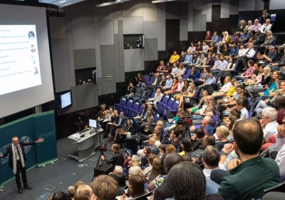 Students and alumni in John Snow Lecture theatre