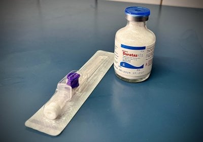 A syringe and a vial