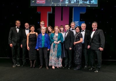 LSHTM staff collecting a Times Higher Education award in 2016
