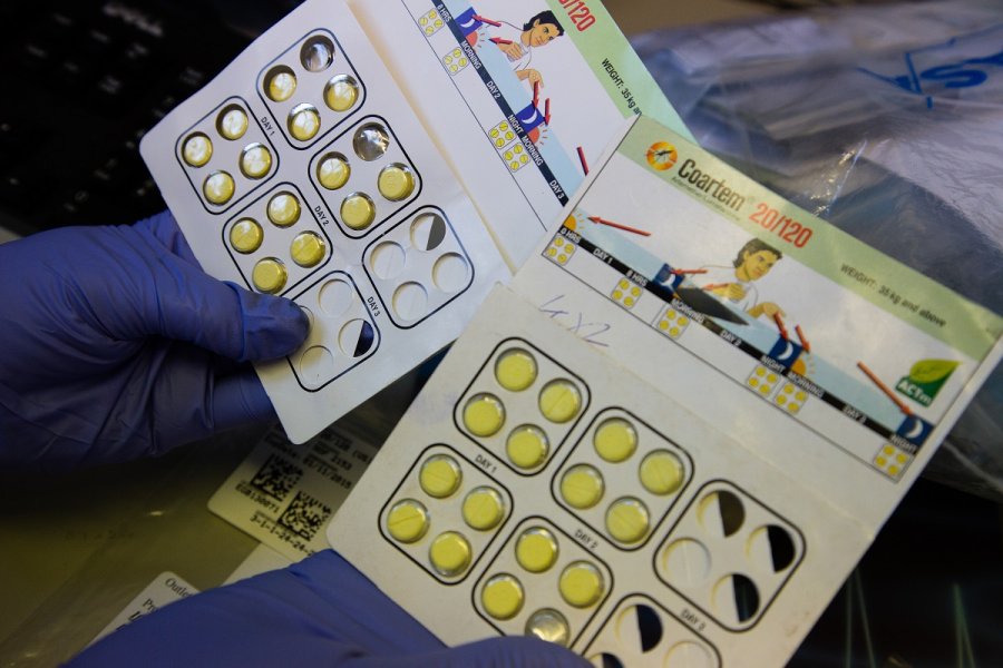 Image: Checking antimalarial drug samples. Credit: Jon Spaull