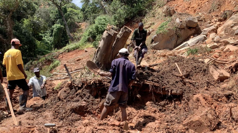 Residents searching for a victim after Cyclone Idai triggered a landslide in Chimanimani District, Zimbabwe.