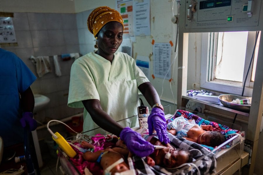 A research nurse checks the temperature of a preterm baby, at Edward Francis Small Teaching Hospital, Banjul