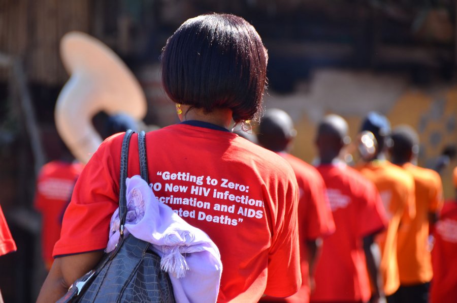 A concerned parent in Kampala, Uganda, attends a &quot;Getting to ZERO&quot; awareness campaign aimed at getting zero new HIV infections.