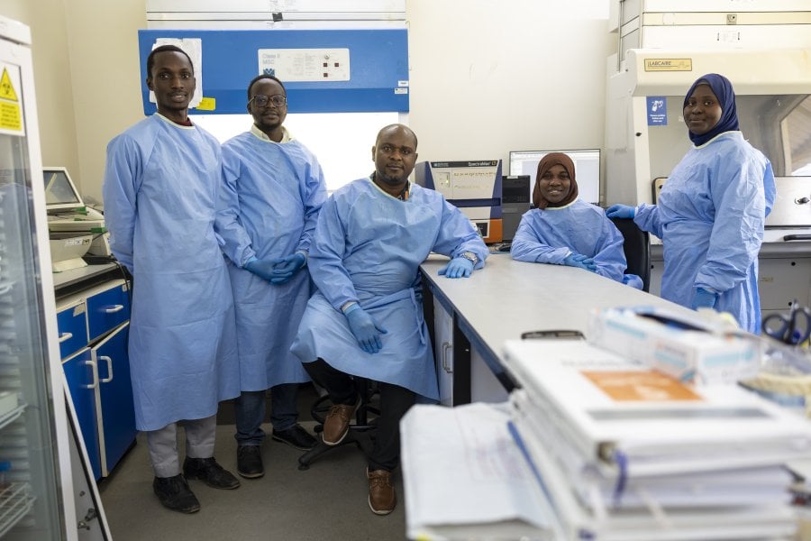 A team of scientists in a lab