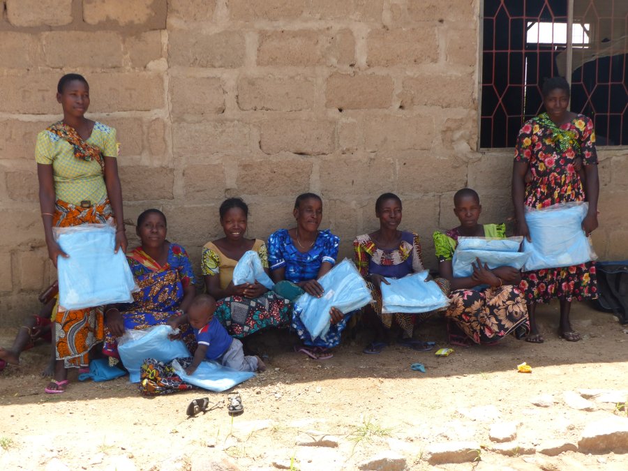 Women with mosquito nets, Busolwa, Tanzania. 