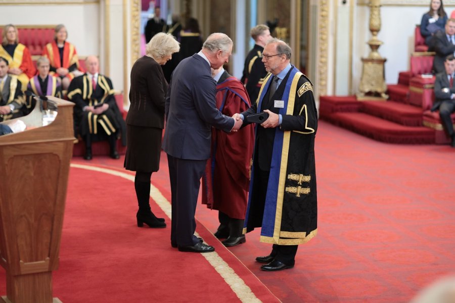 Caption: Peter Piot accepting Queen's Anniversary Prize. Credit: BCA Film/LSHTM