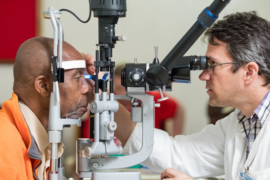 Glaucoma patient getting a check up with Dr Heiko Philippin at KCMC in Moshi, Tanzania. Credit: CBM/Daniel Hayduk