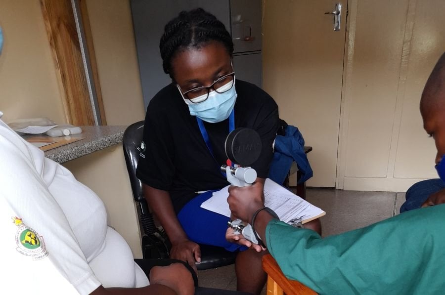 Study participant using a Jamar dynamometer (grip strength machine) to assess muscle strength in the arms. Credit: VITALITY RCT