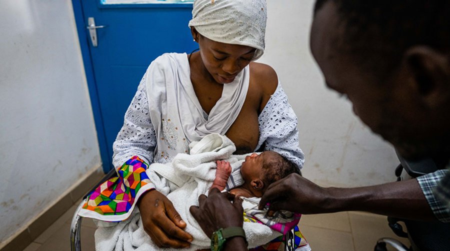Baby receives vaccination in Serekunda